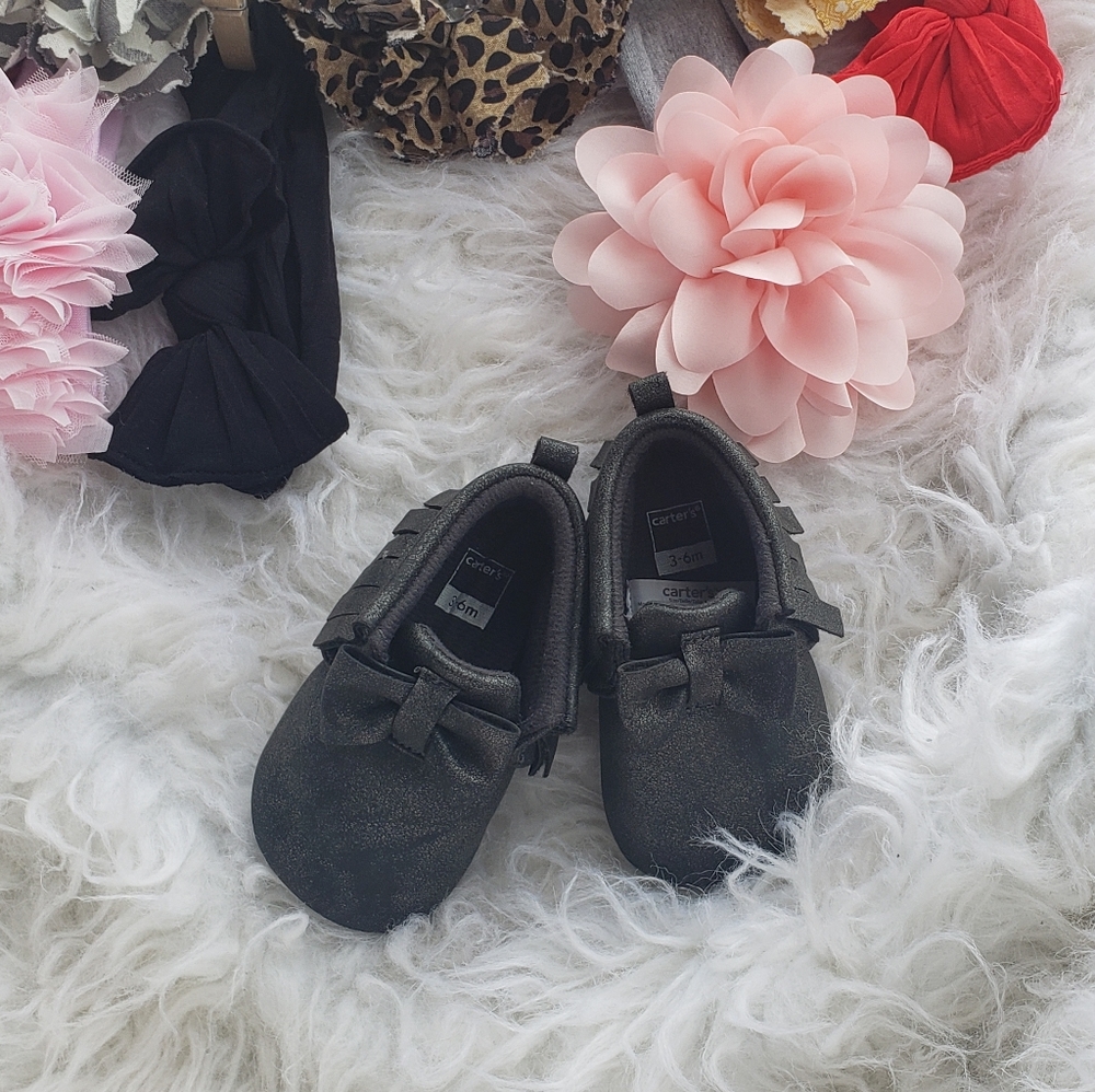 NWOT Baby moccasins black with bow & fringe